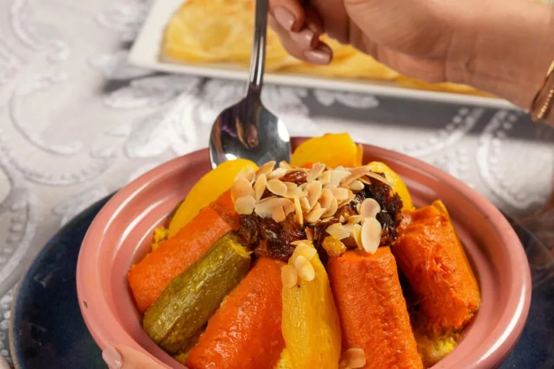 Moroccan couscous dish with vegetables at Riad Dar Chrifa, a traditional restaurant in Rabat.
